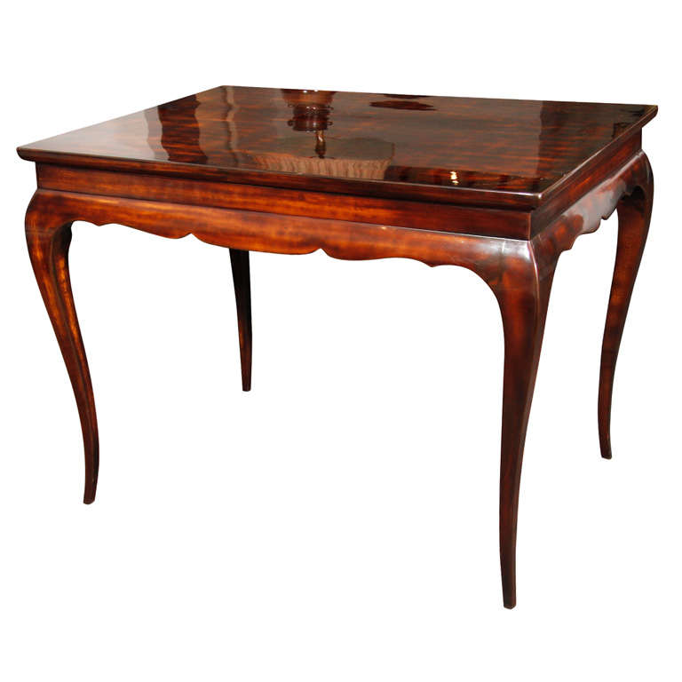 Fine lacquered rectangular table by Maison Jansen (1880-1972)<br />
raised on scroll carved apron and cabriole legs. Lacquered wood.<br />
Stamped: JANSEN 9 Rue Royale<br />
<br />
See: Jansen Furniture by James Archer Abbott.  Acanthus Press,